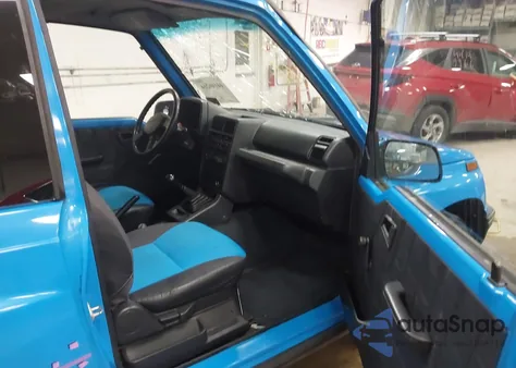 1992 Geo Tracker from USA, damaged, VIN 2CNBJ18U6N6921488